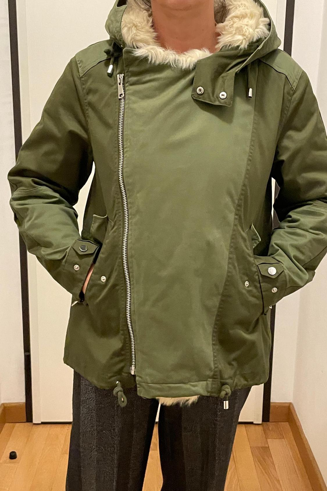 Green jacket set with hood and visible zips