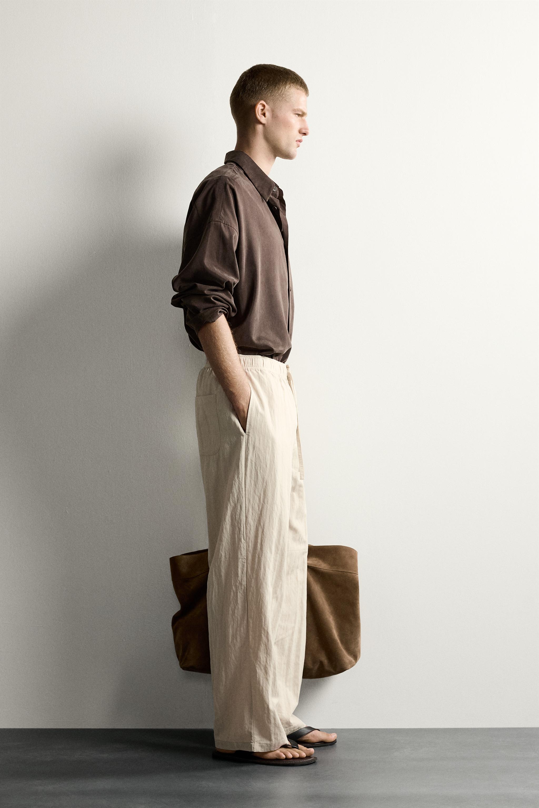 CRINKLED EFFECT TECHNICAL RELAXED FIT PANTS