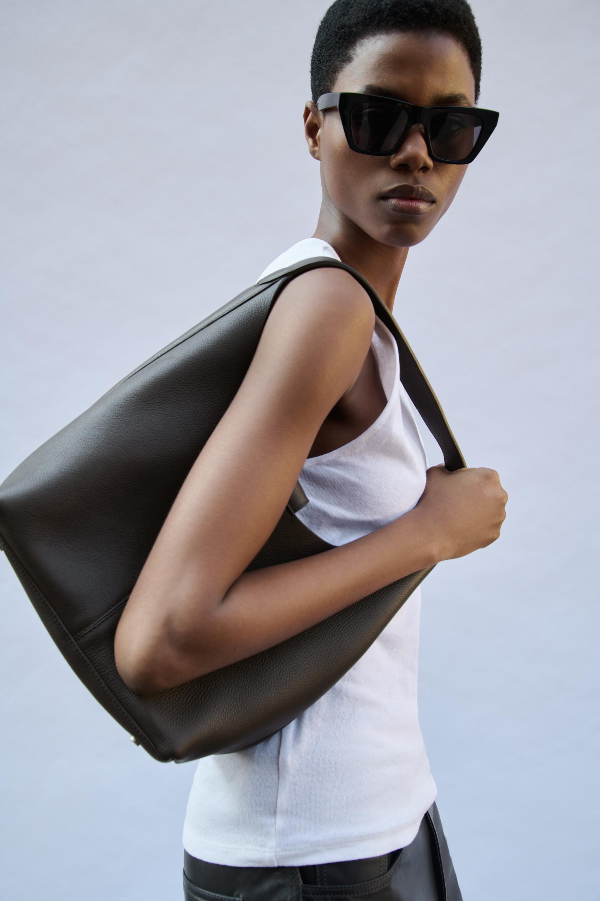 GRAINED EFFECT LEATHER BUCKET BAG