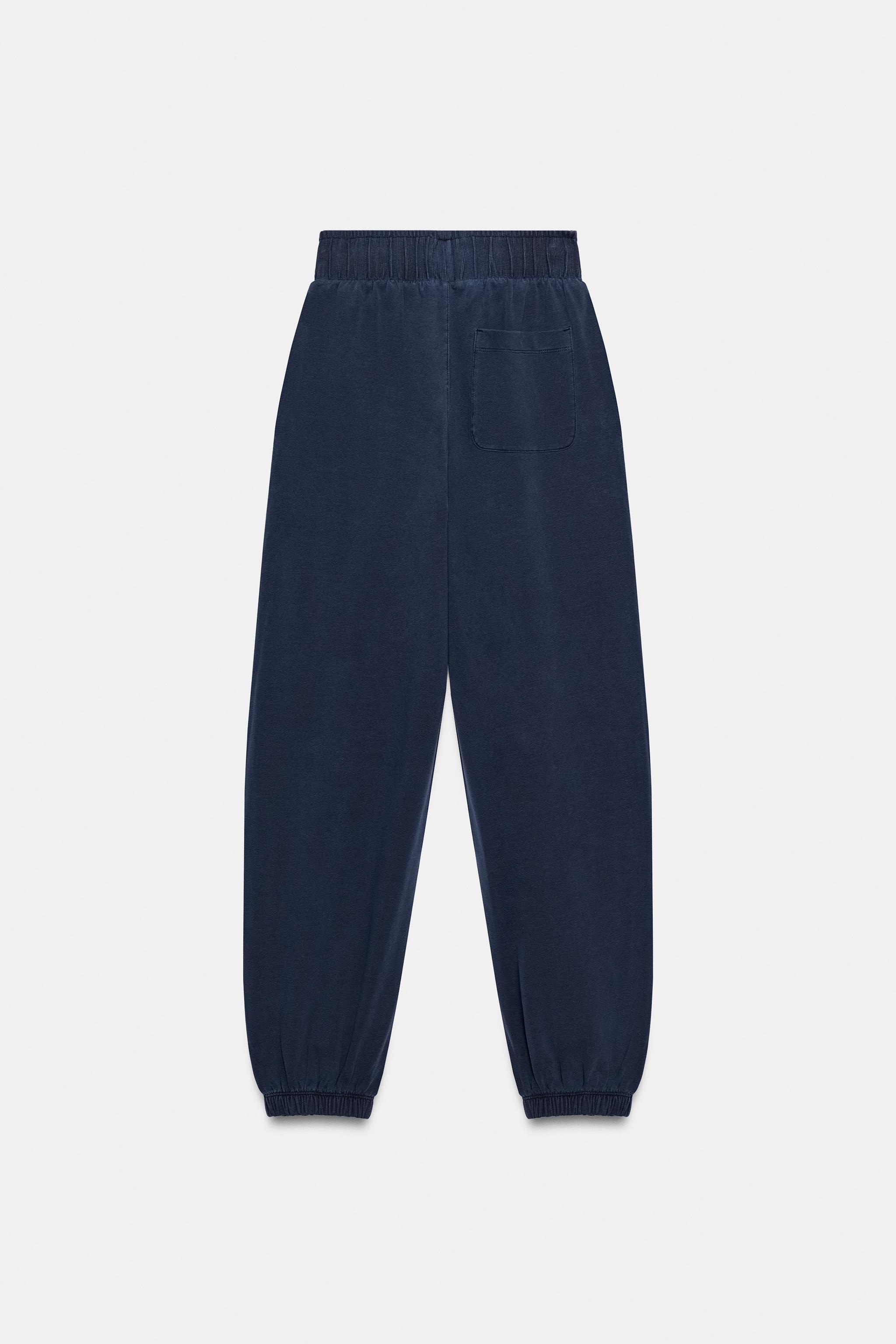 WASHED EFFECT PARACHUTE PANTS