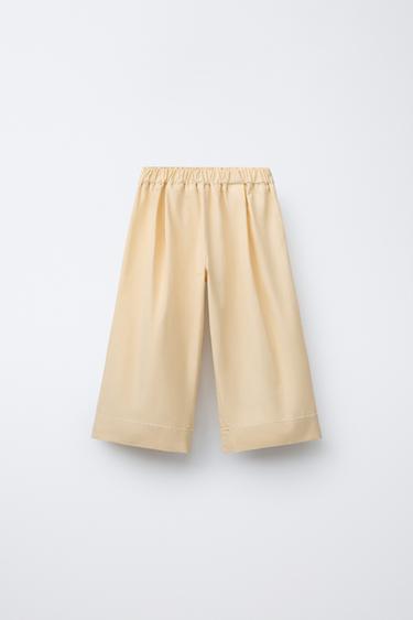 بنطلون كولوت بزمات ودانتيل شريطي - زبدة الخاص بـ Zara - صورة 0