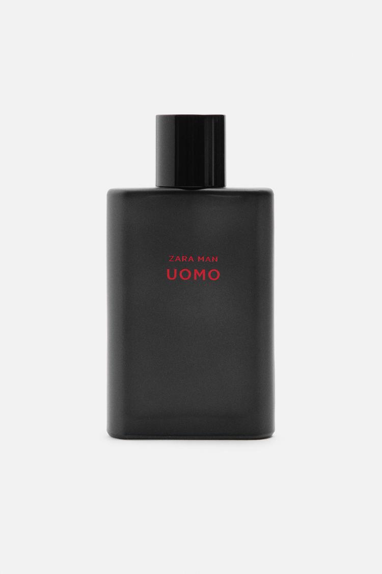 Flacon de parfum noir avec le texte 'ZARA MAN UOMO' en rouge.