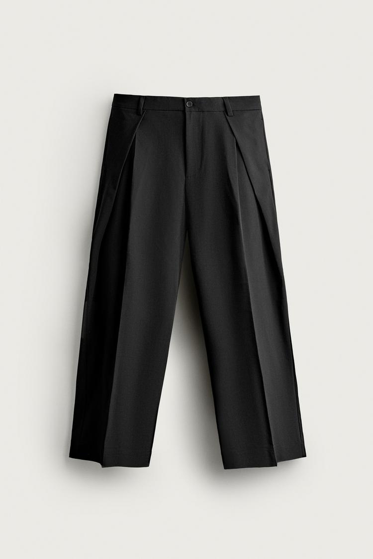 Pantalon relaxed fit pliegues