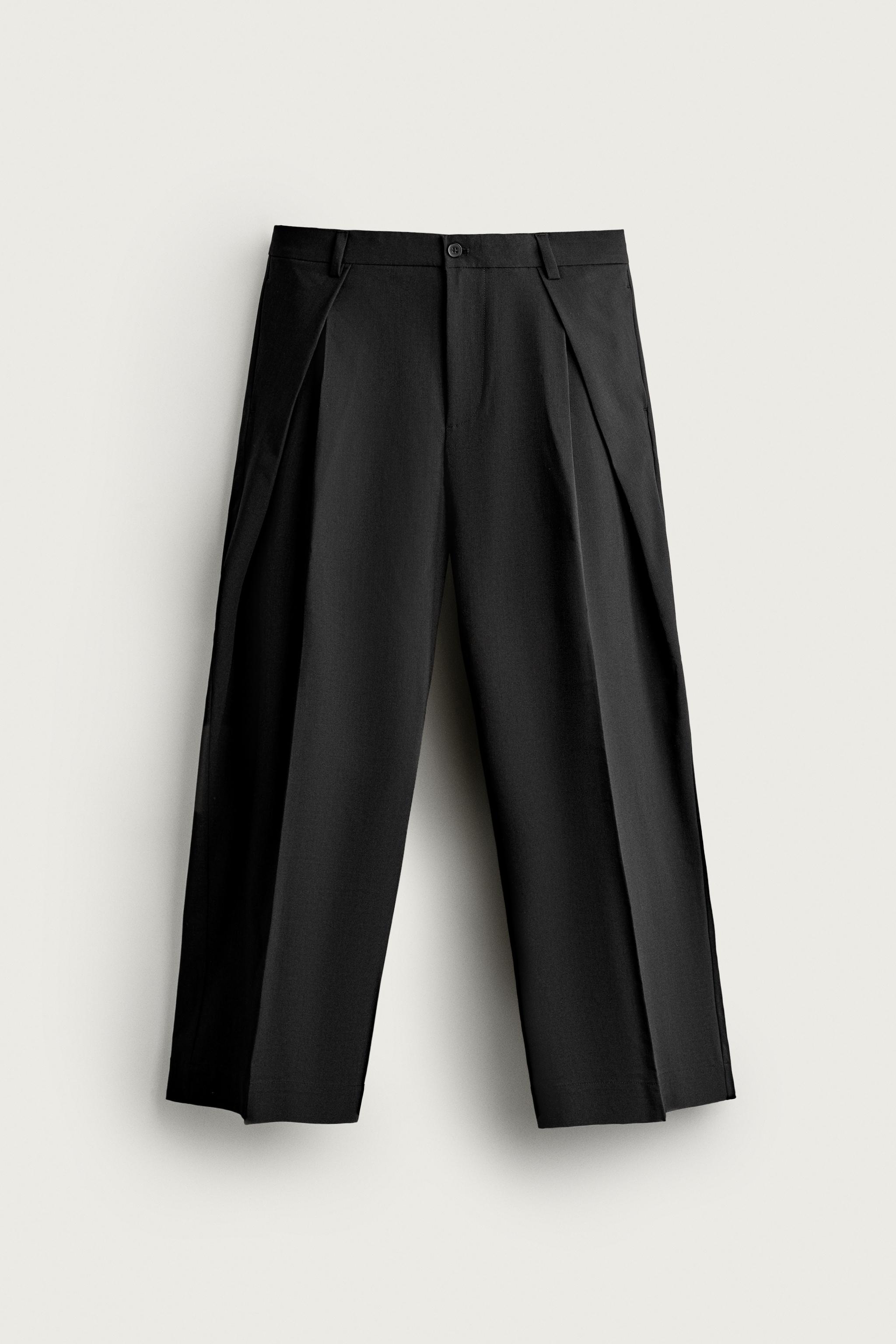 RELAXED-FIT PLEATED PANTS