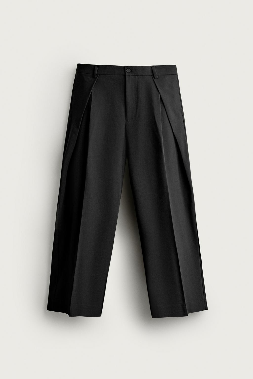 RELAXED FIT PLEATED TROUSERS