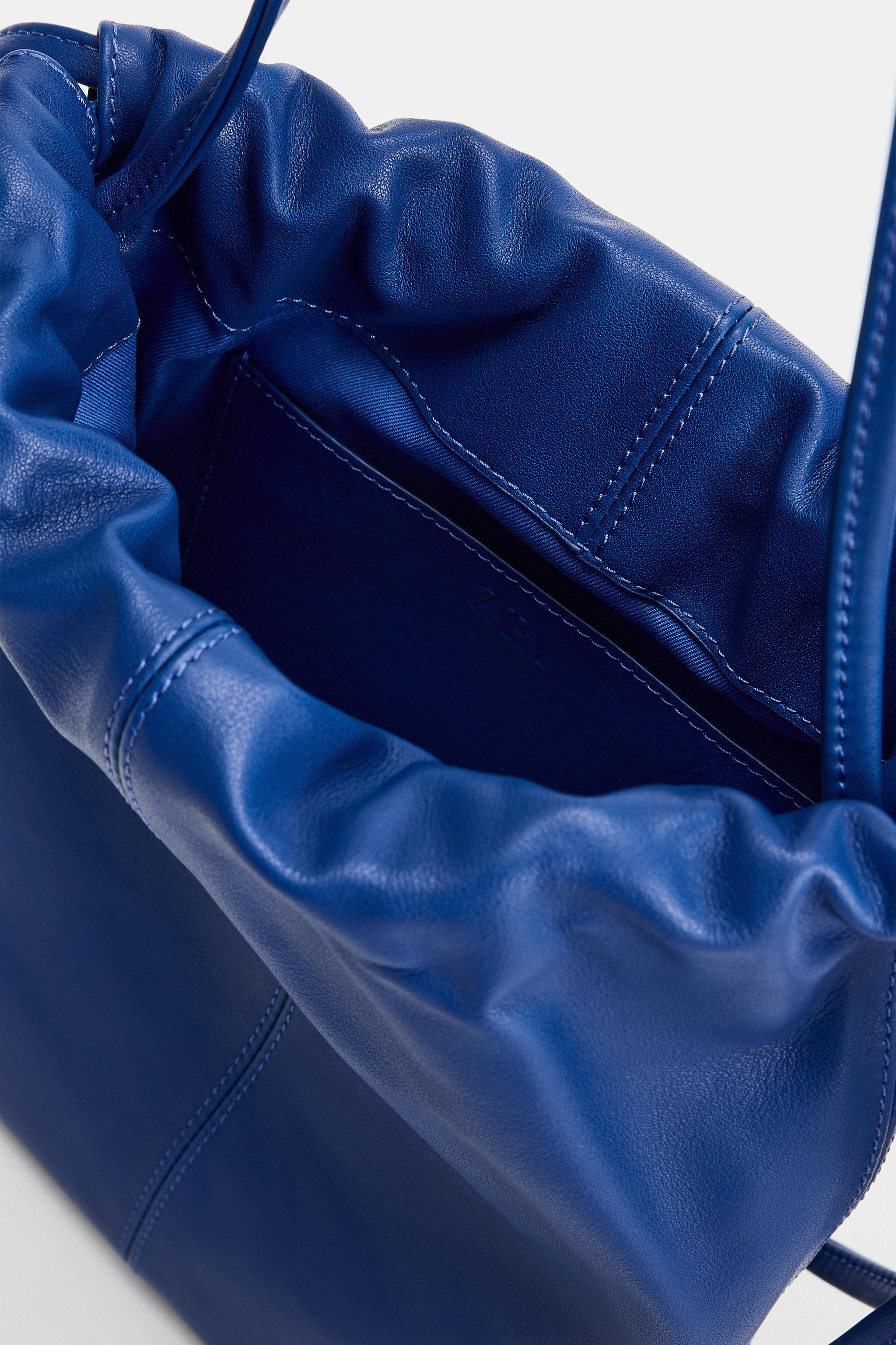 LEATHER DRAWSTRING CROSSBODY BAG