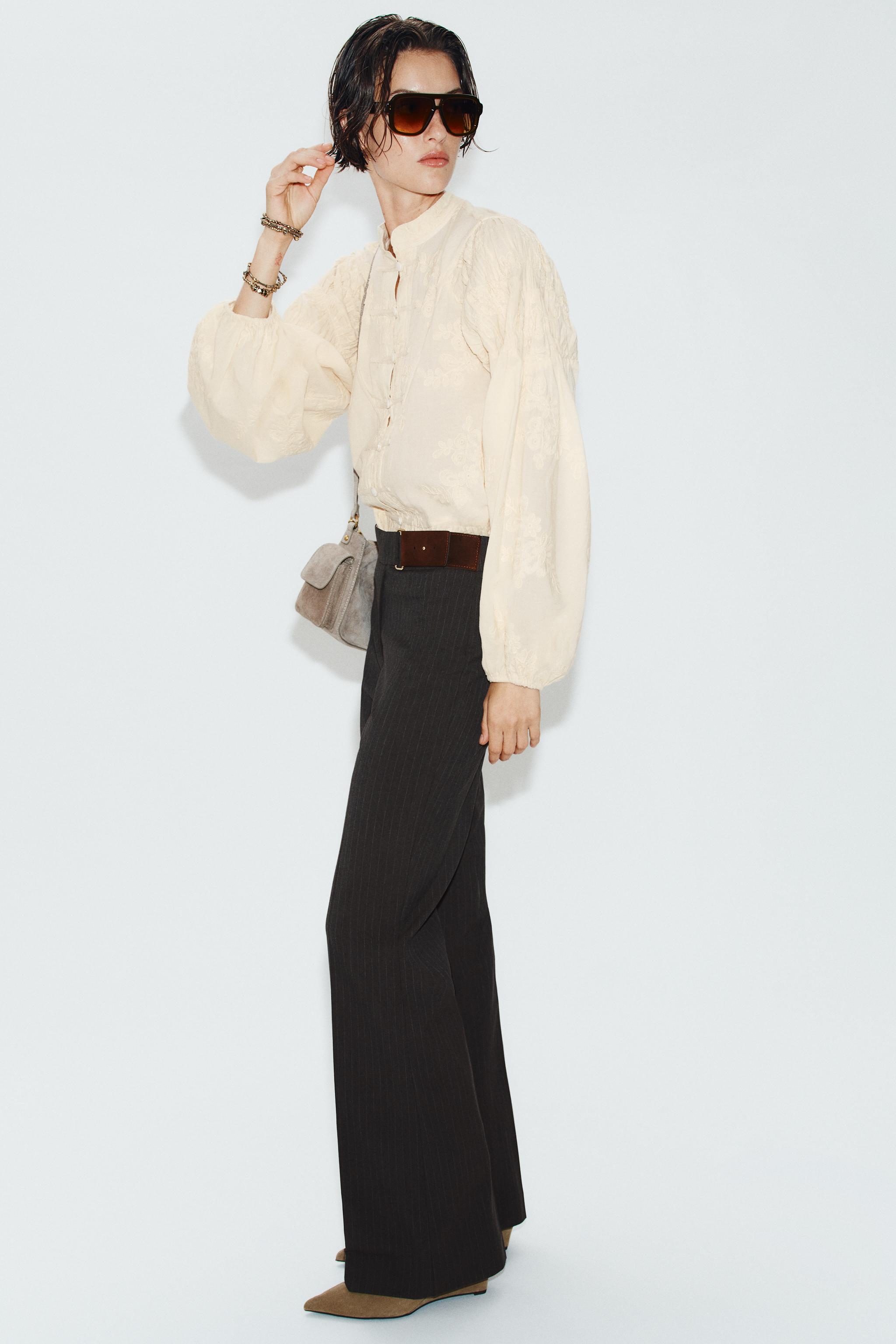 BUCKLE FLARE PANTS