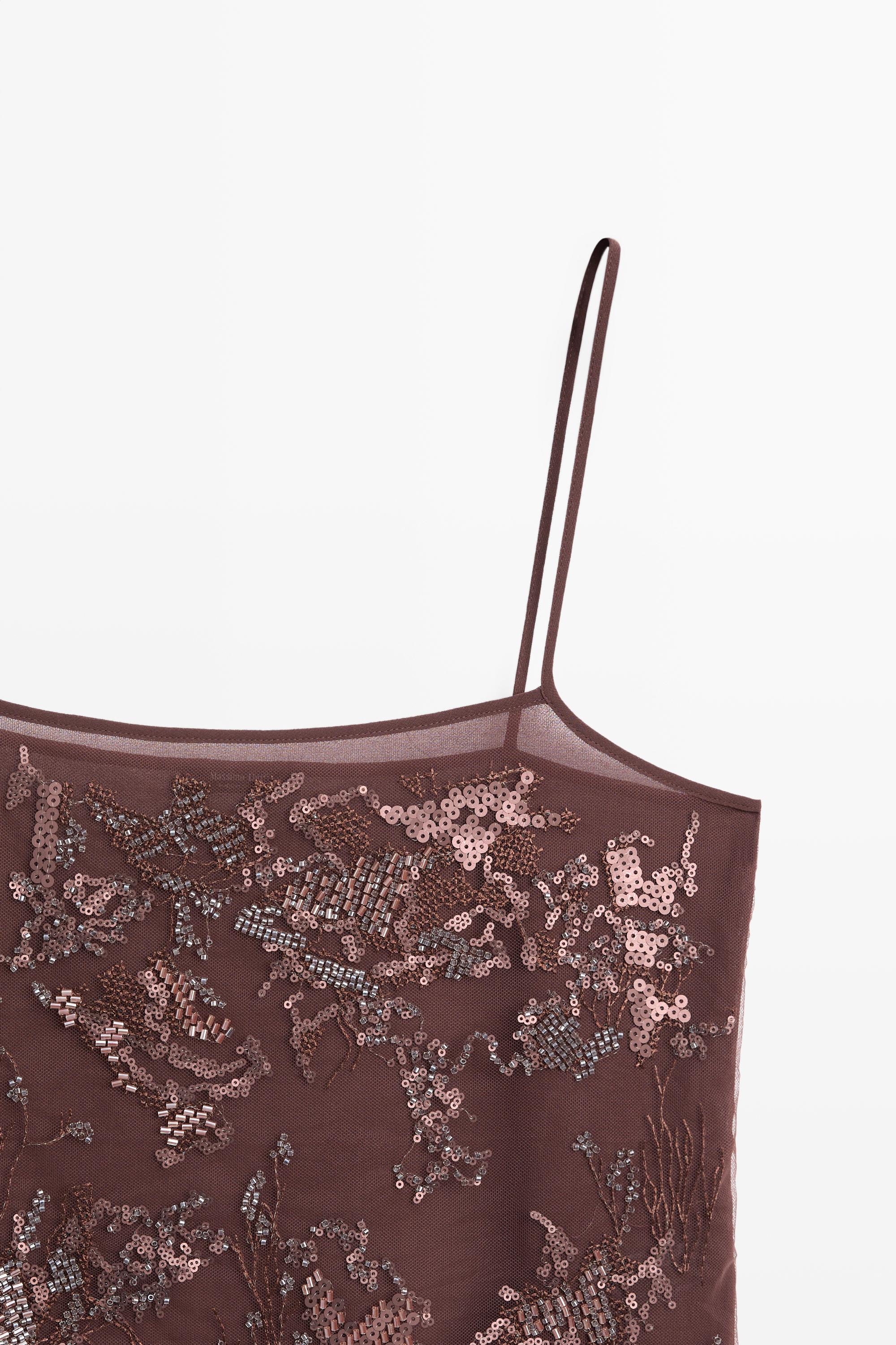 Flowing strappy top with embroidered detail