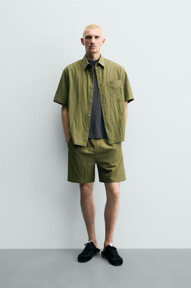 Zara RELAXED FIT FLOWY SHORTS - Dark olive