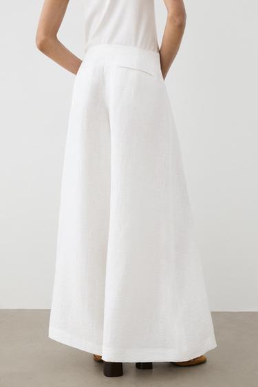 Pantalon palazzo en lin mélangé - Blanc cassé de Zara