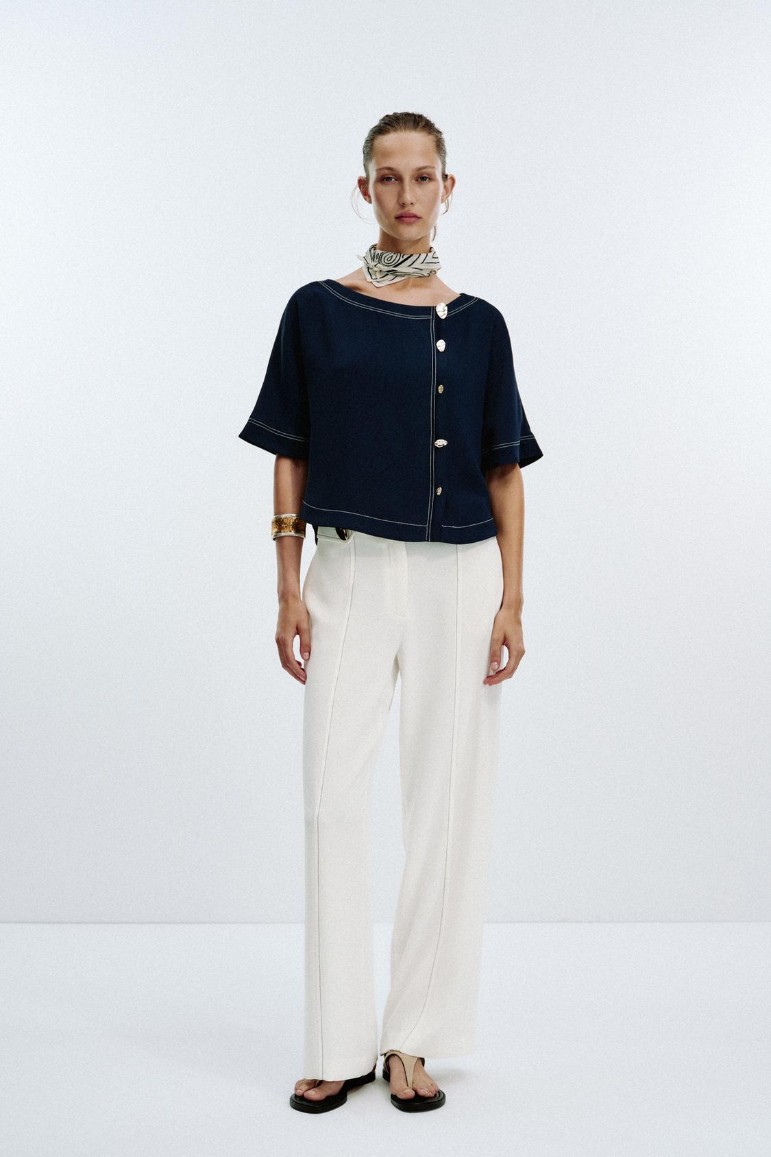 TOPSTITCHED TOP