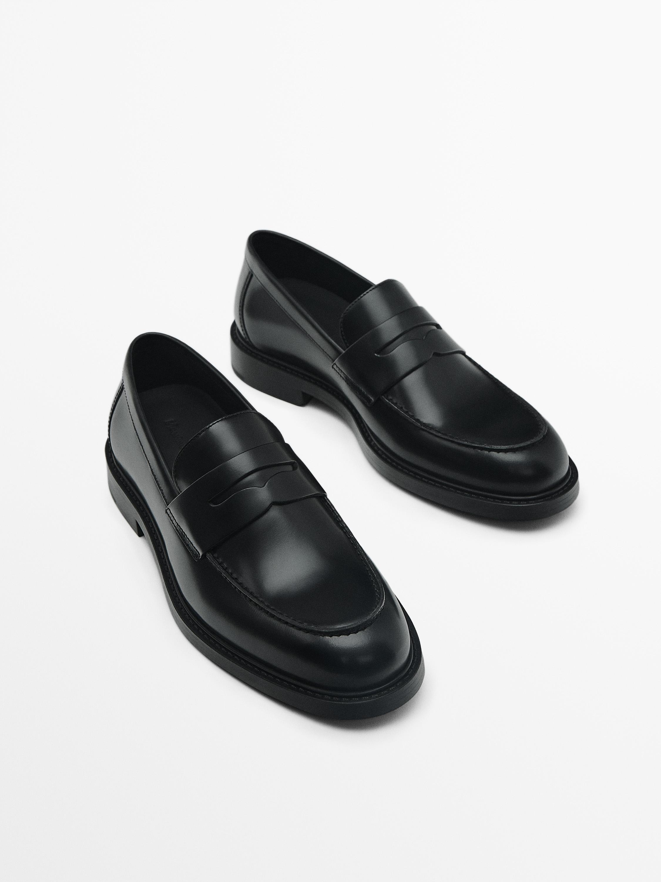 Black leather penny loafers