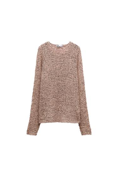Front view of a beige knit sweater with a round neck and long sleeves.