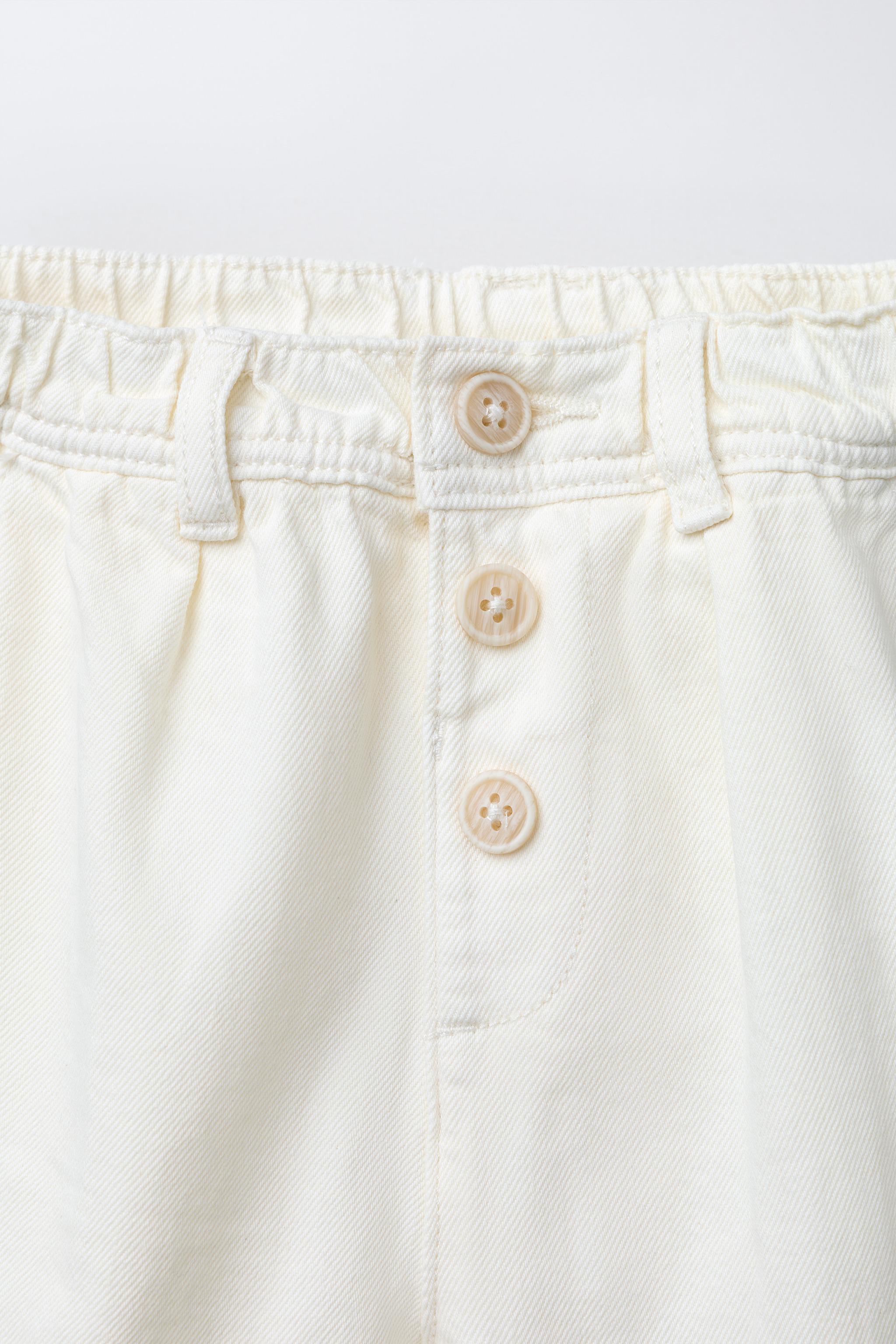 PANTALON À BOUTONS