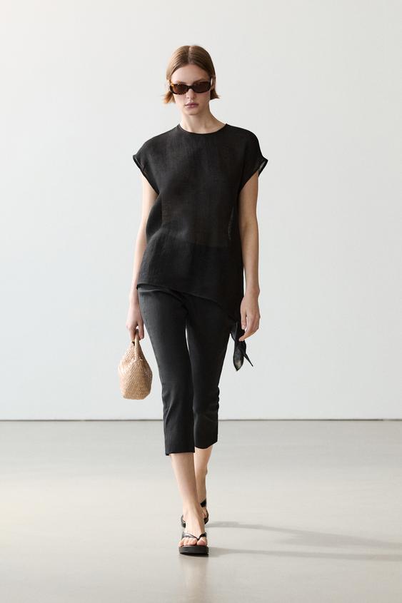 Flowing asymmetric linen top from Zara - $130