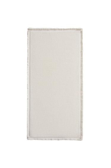 TAPETE FLECOS - Blanco roto de Zara