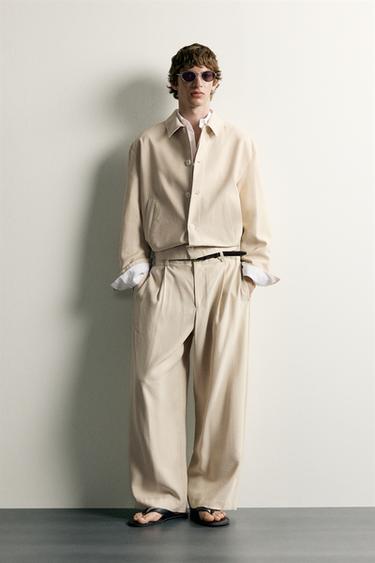 RELAXED FIT PLEATED TROUSERS - Beige by Zara