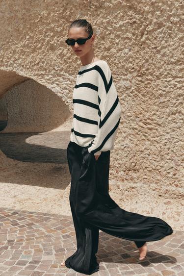 PANTALÓN FLUIDO ANCHO - Negro de Zara - Imagen 0