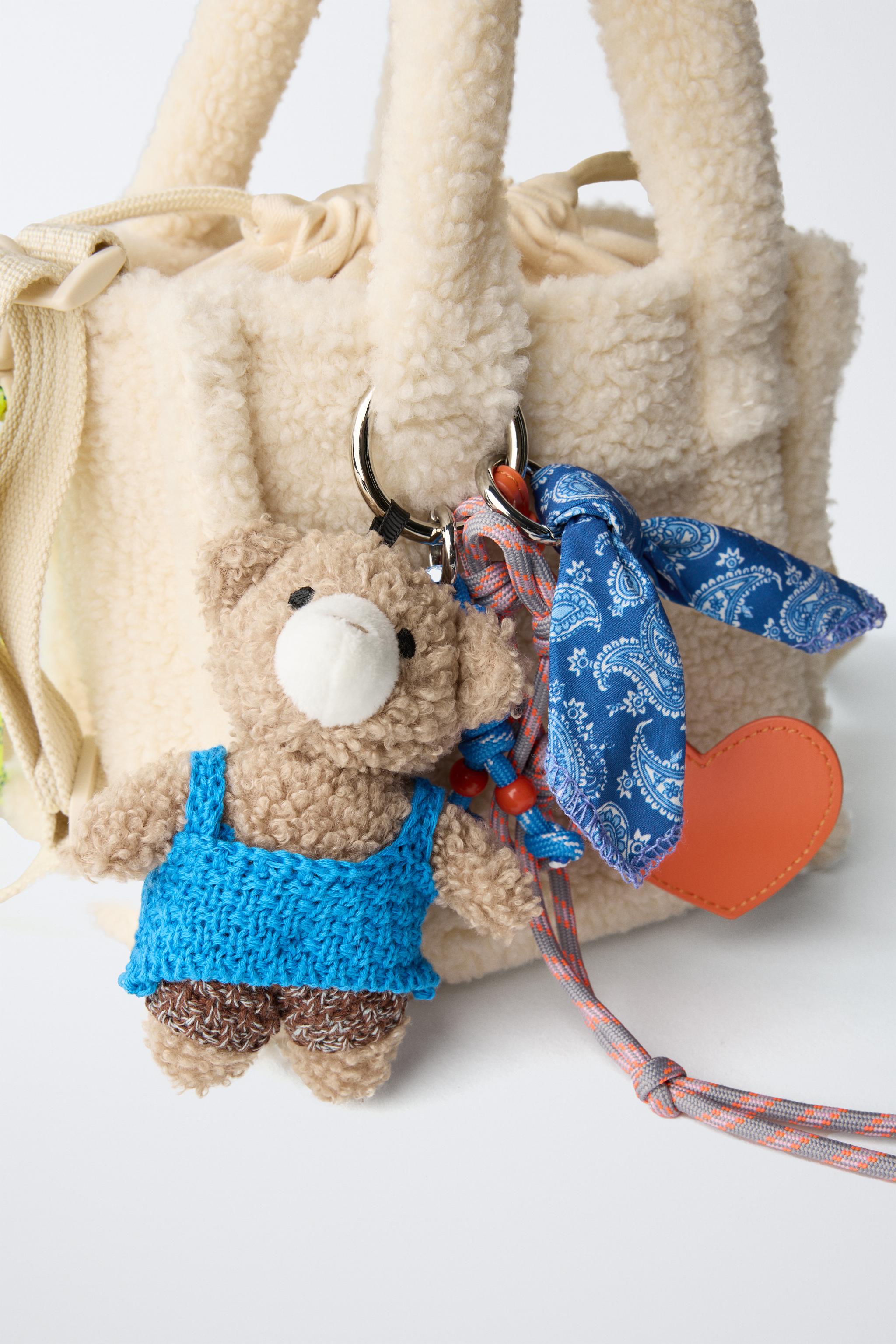 SAC BANDOULIÈRE EN PEAU DE MOUTON CHARM