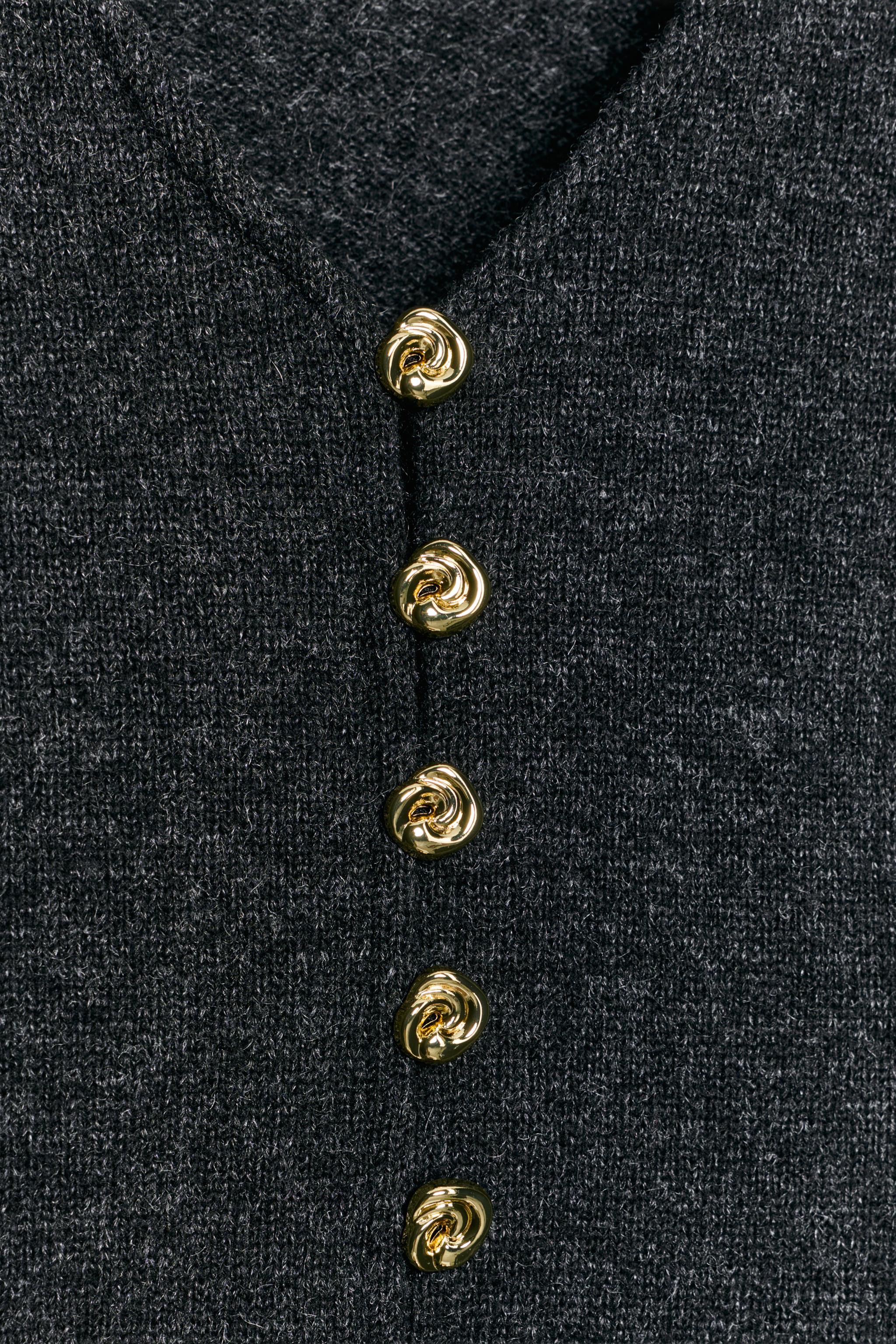 GILET PEPLUM À BOUTONS