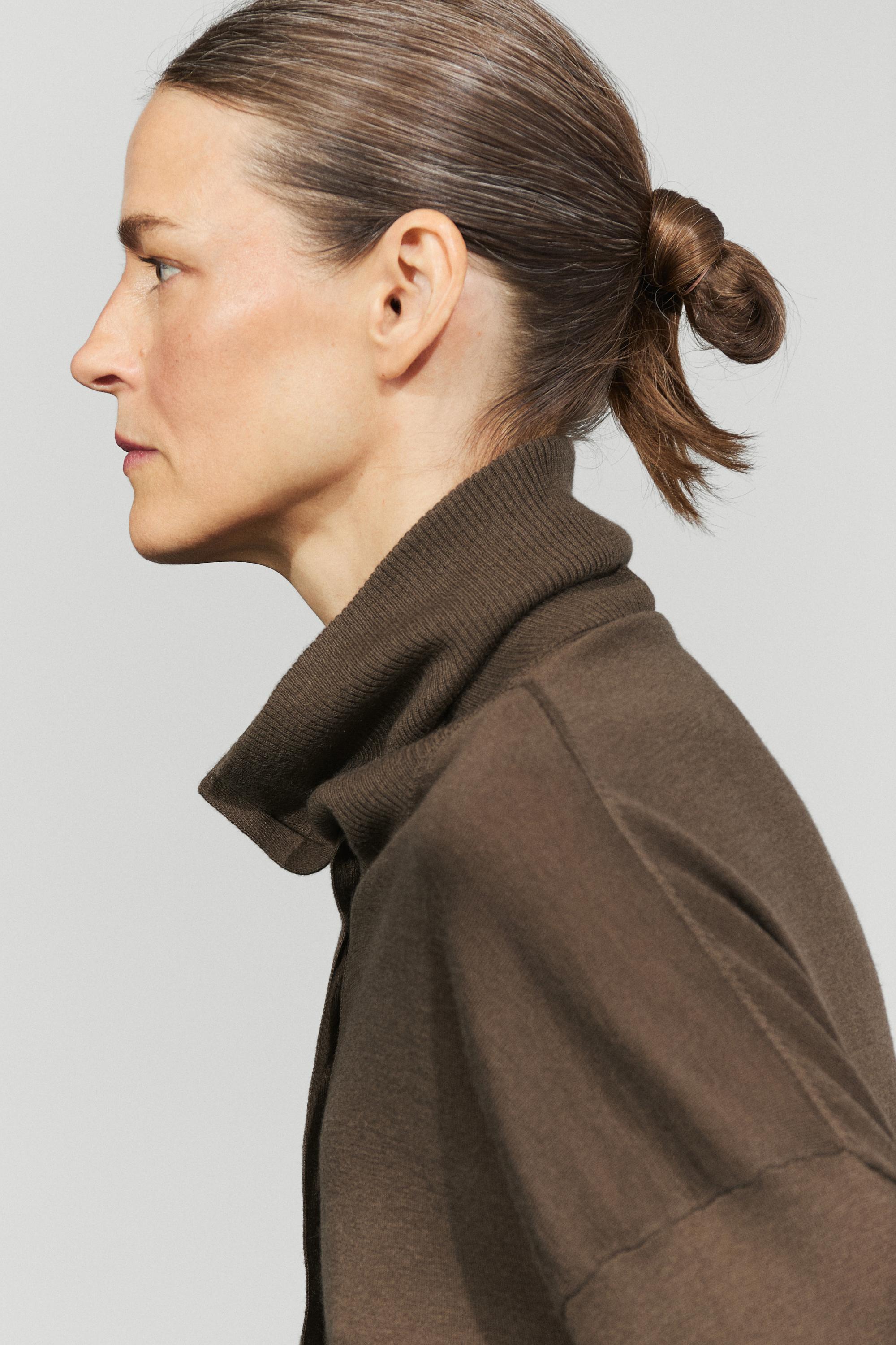 Turtleneck cardigan with button detail