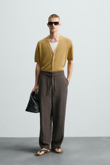 PANTALÓN FLUIDO CORDÓN - Chocolate de Zara - Imagen 0