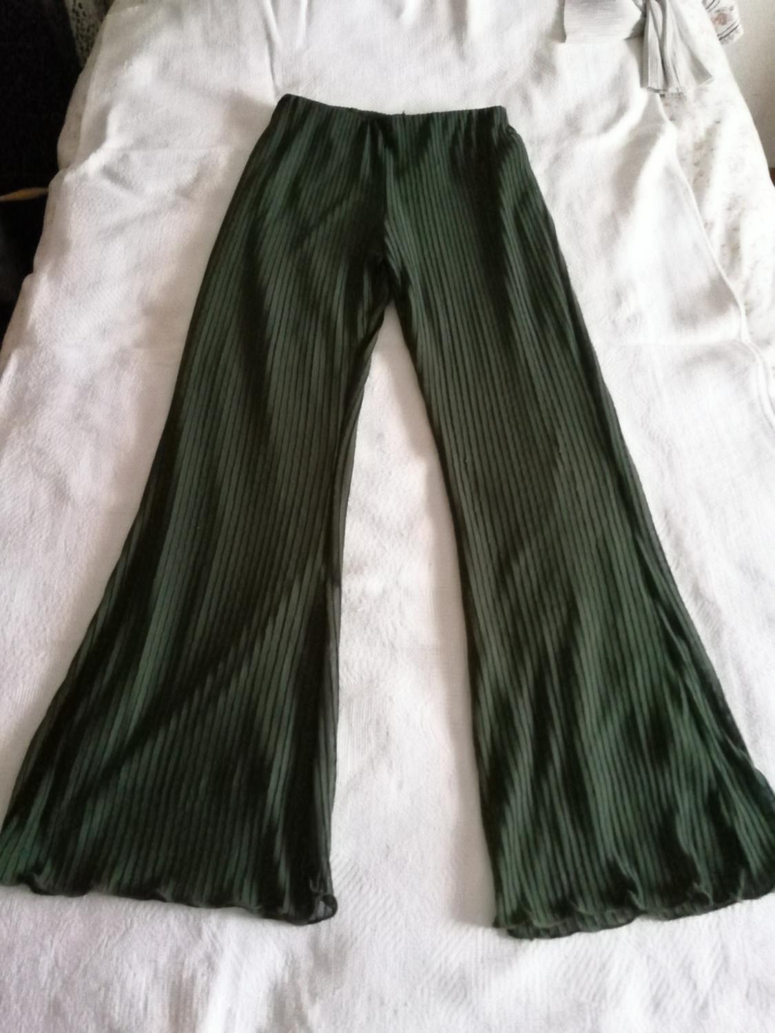 FLARED PLEATED TROUSERS