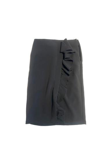 Black skirt with ruffles on the right side, on a white background.
