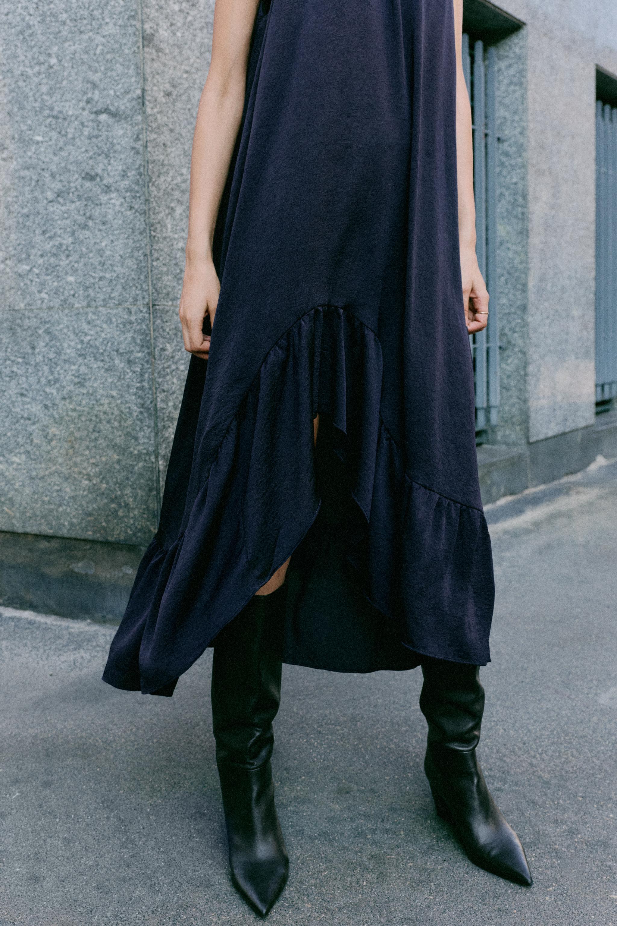 ROBE MI-LONGUE HALTER VOLANT BAS