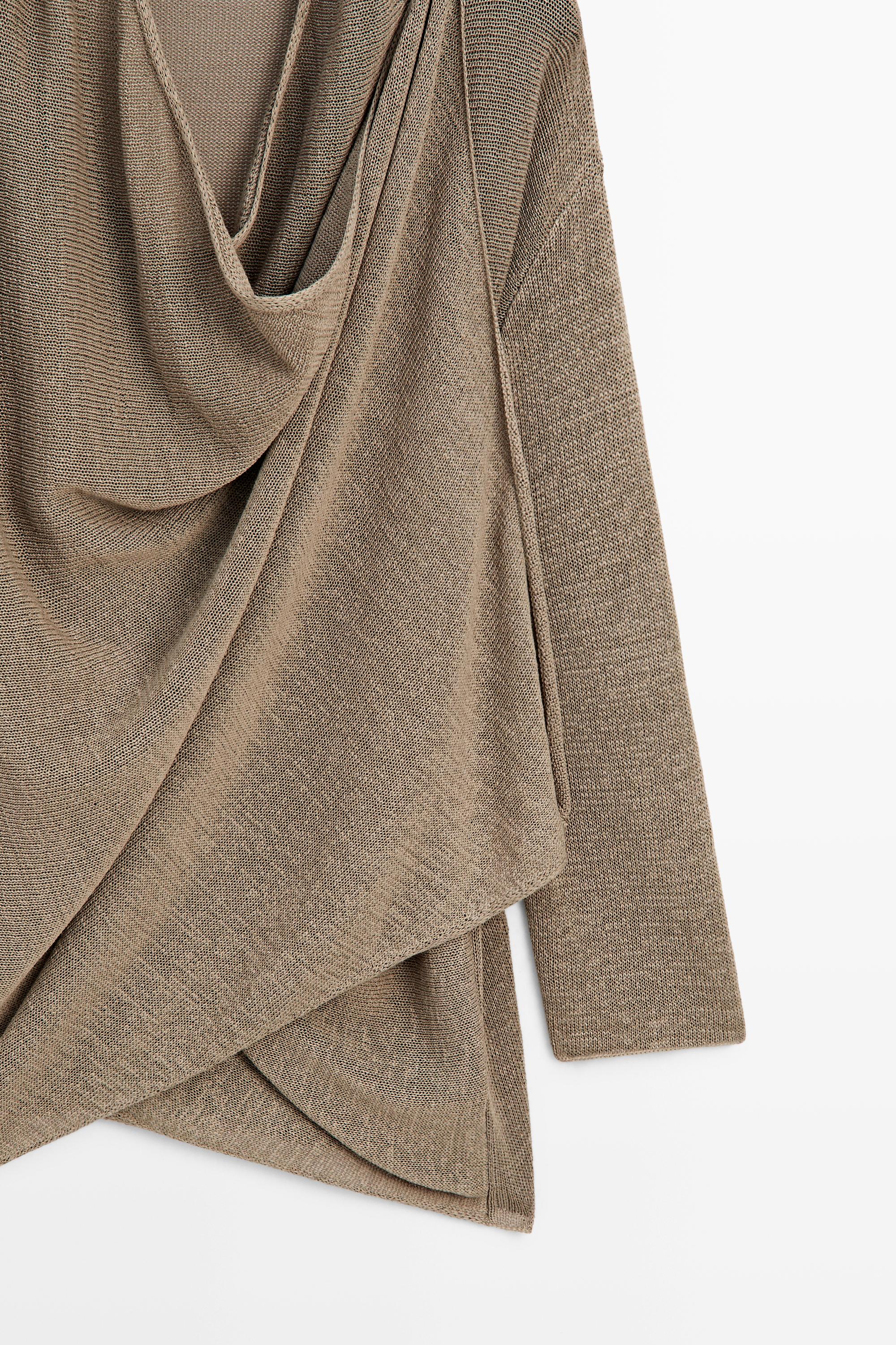 Cardigan cape en maille drapée