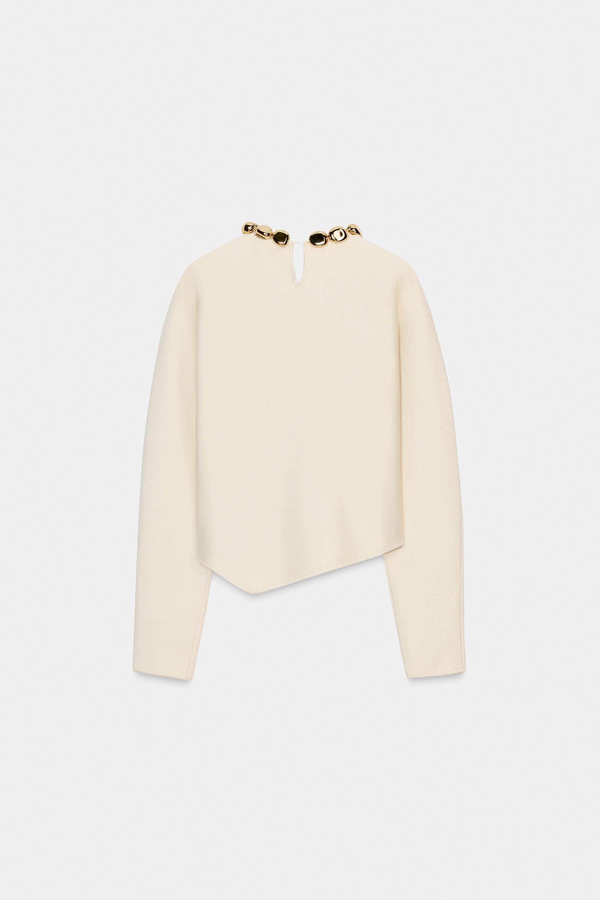 PULL EN MAILLE À BOULES COL