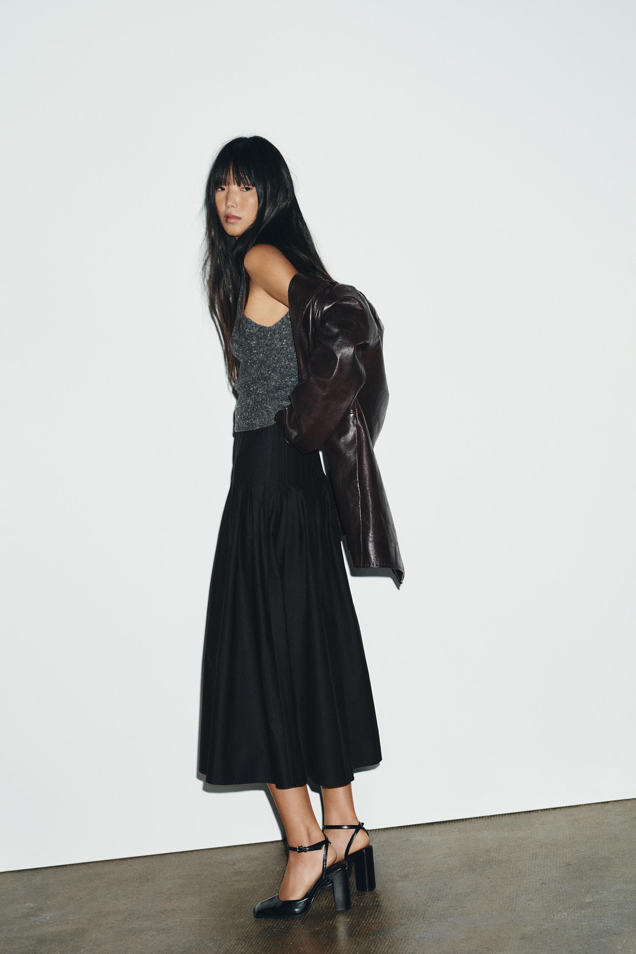 PLEATED MIDI SKIRT