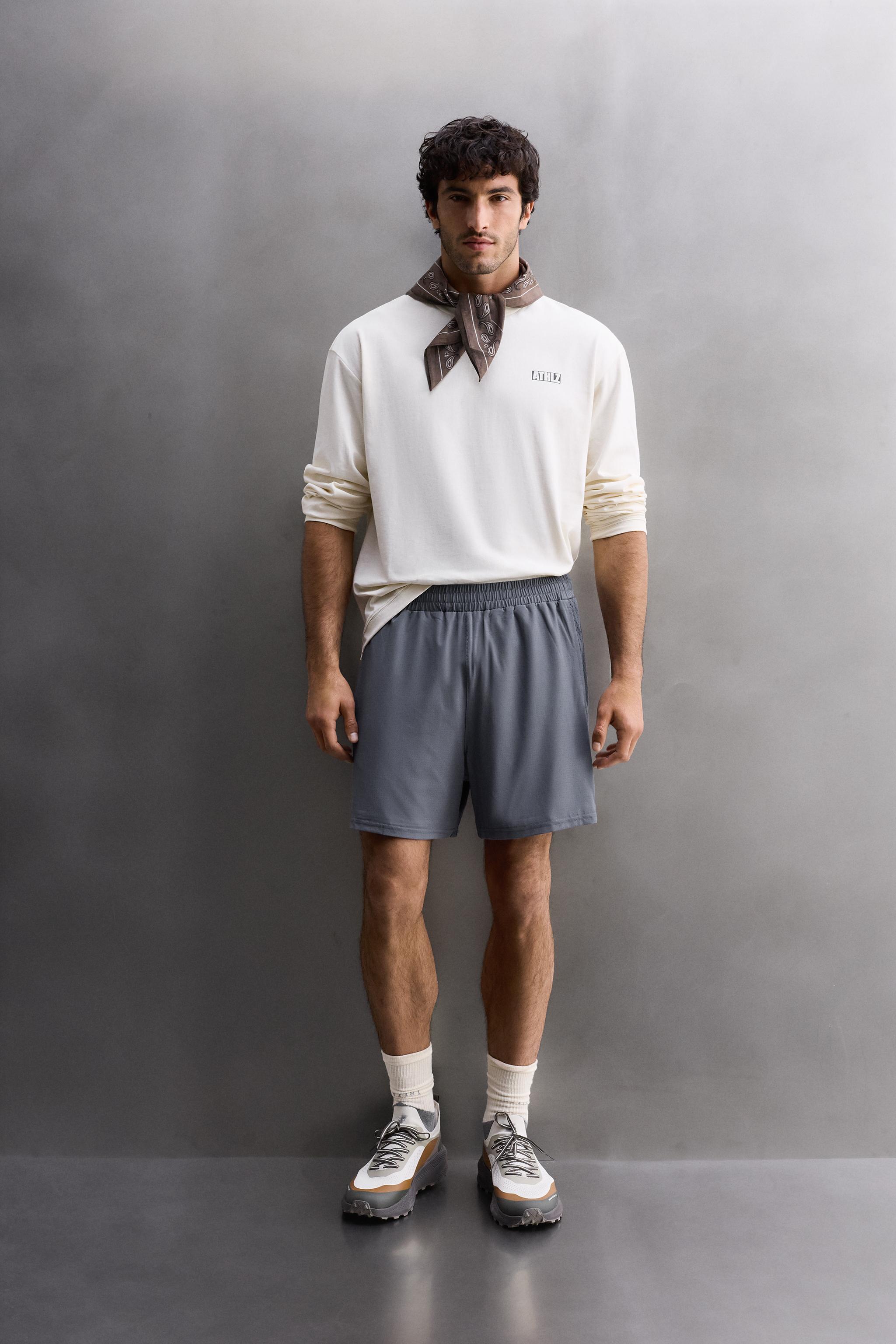 COMBINED PERFORATED SHORTS - Light blue | ZARA United States