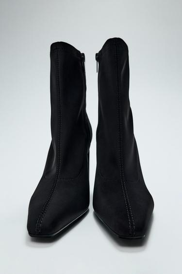TOPSTITCHED HEELED ANKLE BOOTS - Black by Zara