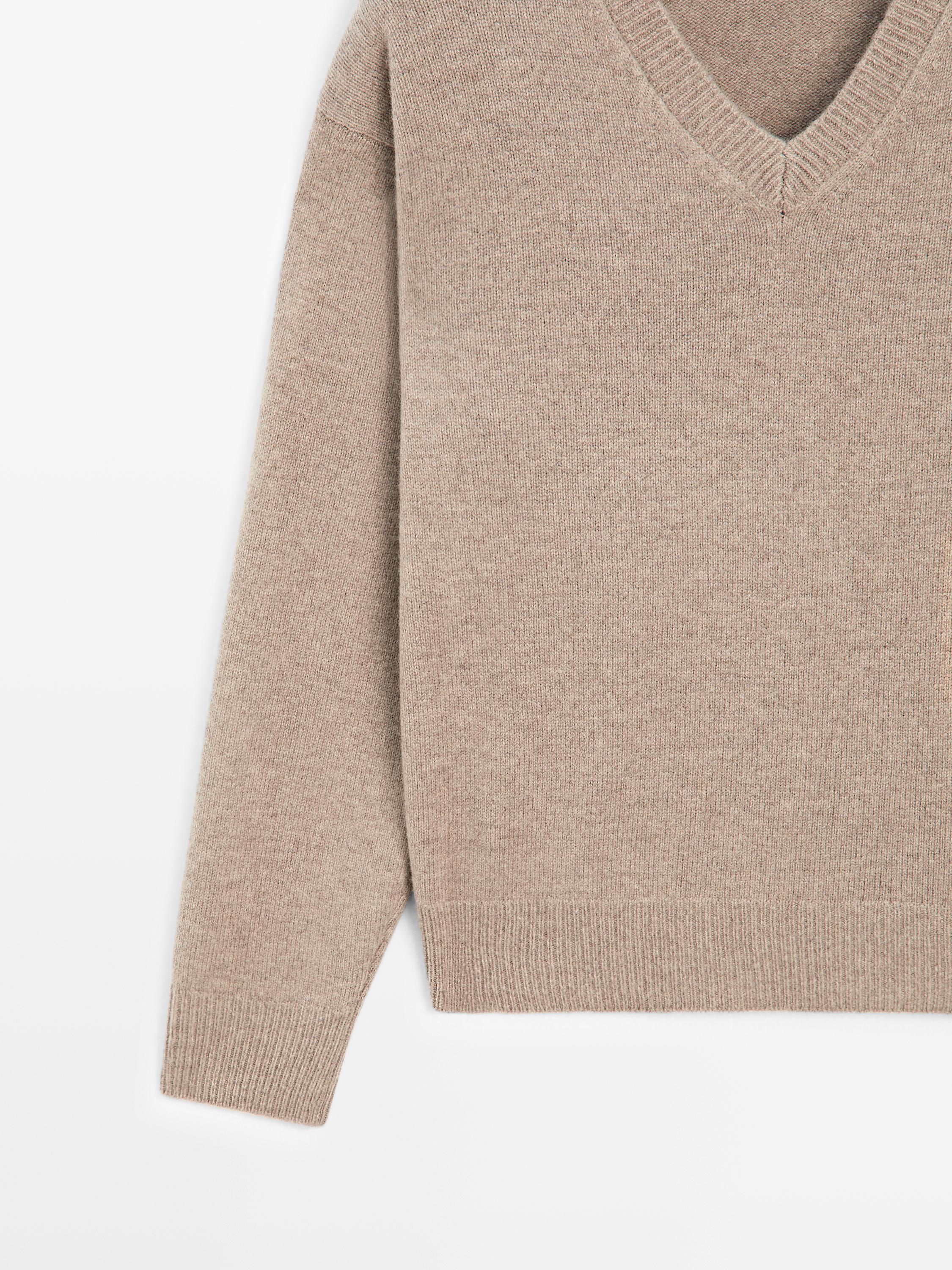 V-neck knit sweater with elbow patches