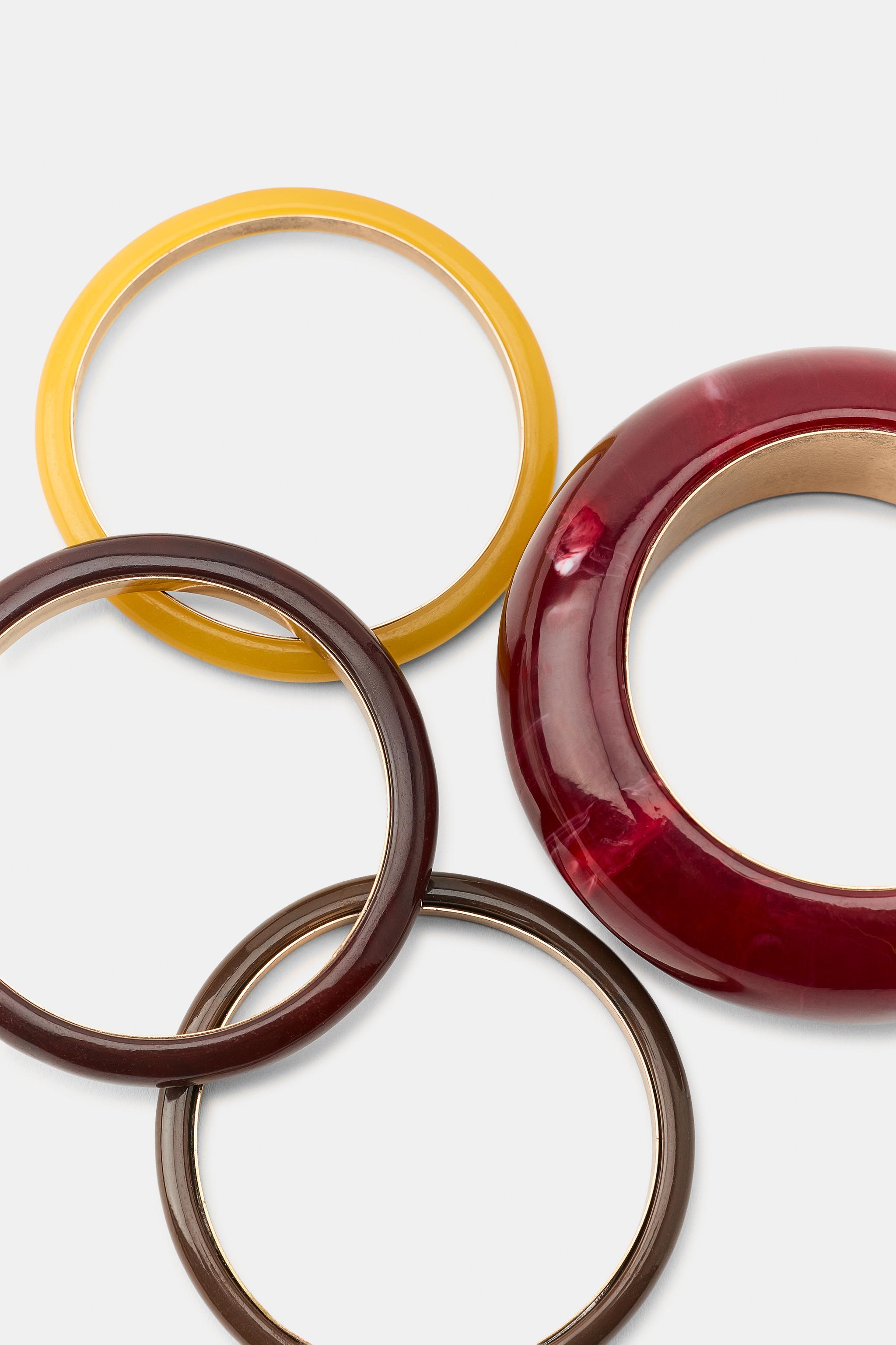 LOT DE 4 BRACELETS RIGIDES EN RÉSINE