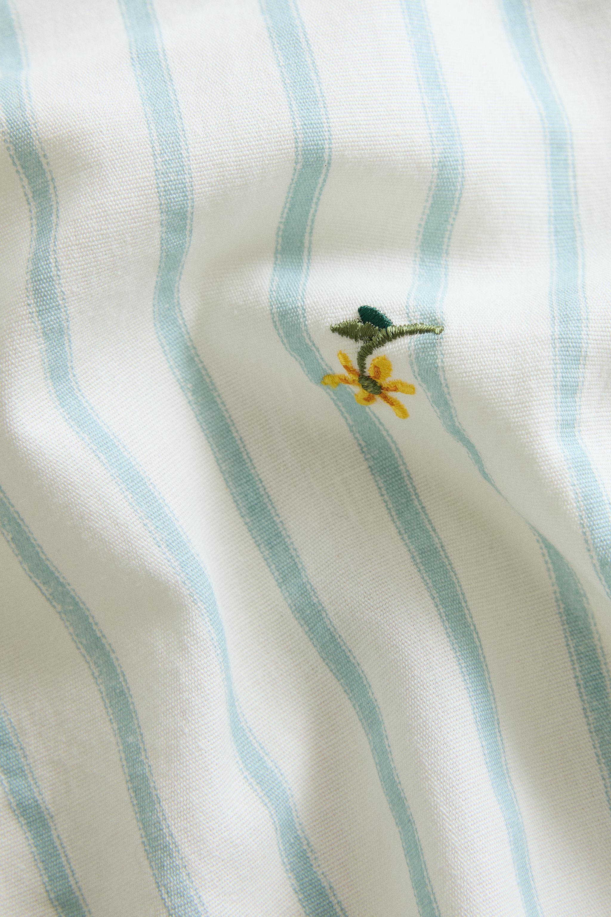 NAPPE RAYURES BRODERIE FLORALE