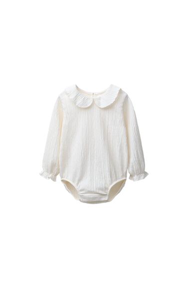 TEXTURED NECK BODYSUIT