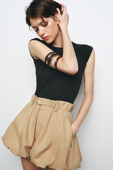 PACK OF RIGID WOODEN BRACELETS - Golden by Zara - Image 1