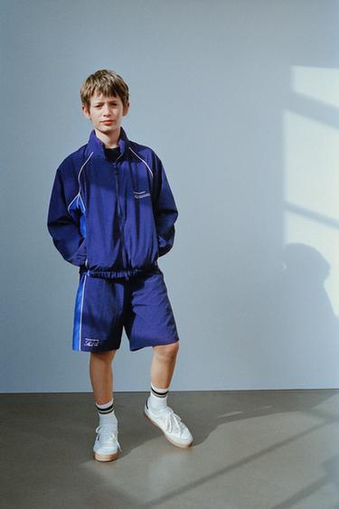 Zara WATER REPELLENT TEXT PRINT HOODED RAINCOAT - Blue