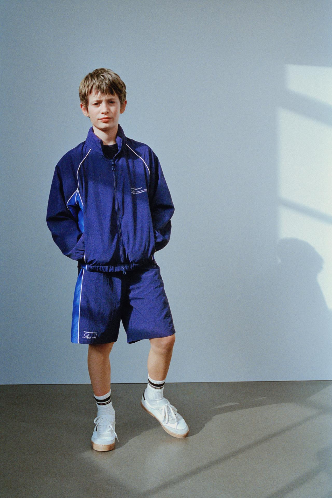 WATER-REPELLENT RAINCOAT WITH SLOGAN PRINT AND HOOD - Blue by Zara