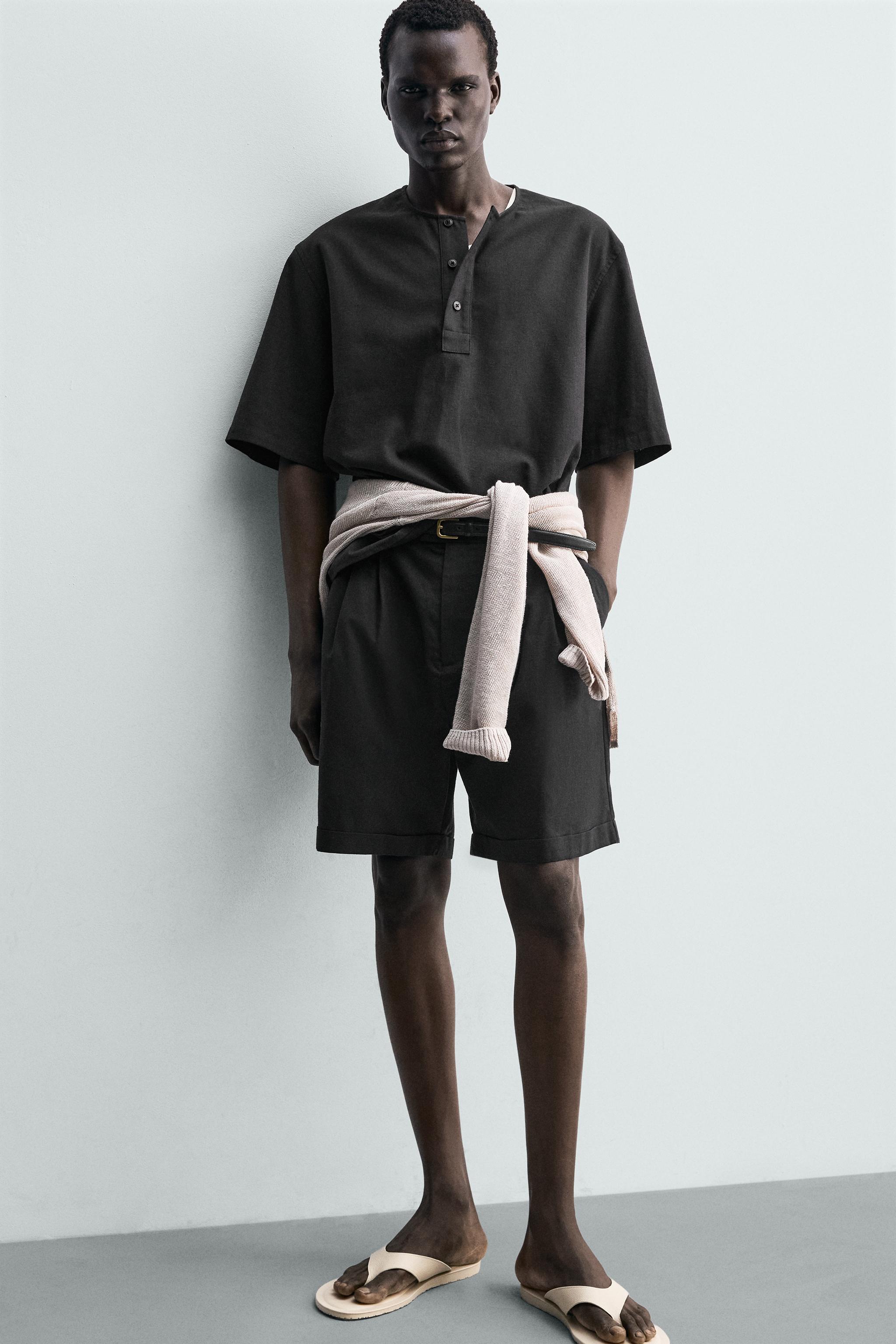 RELAXED FIT PLEATED SHORTS