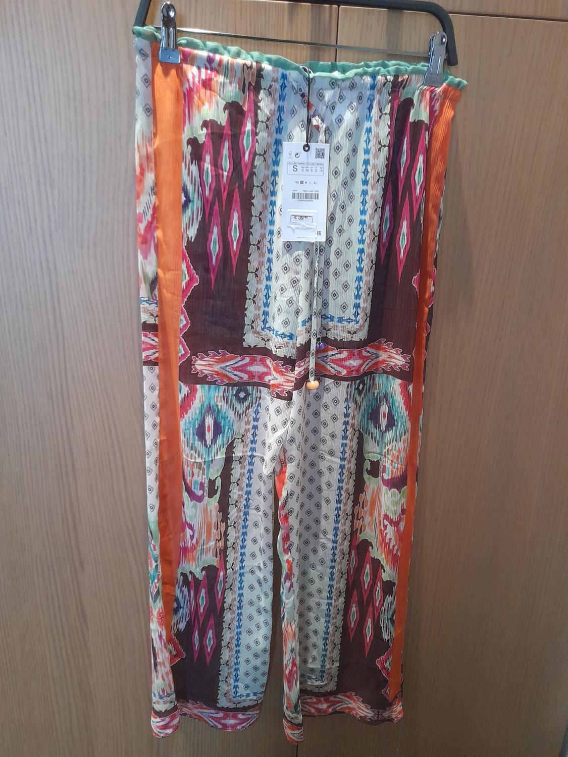 PRINTED FLOWING TROUSERS