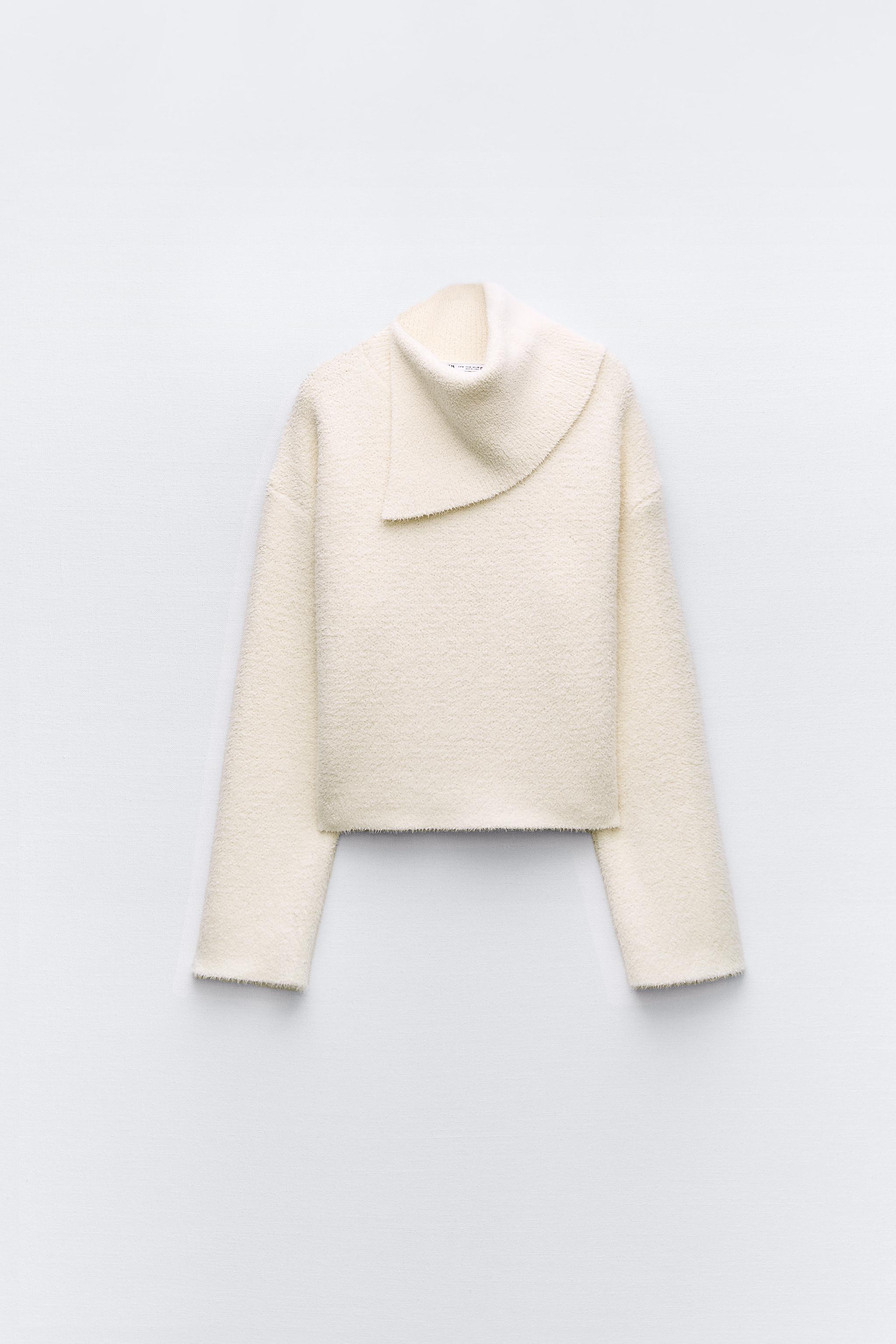 White fuzzy turtleneck on sale sweater