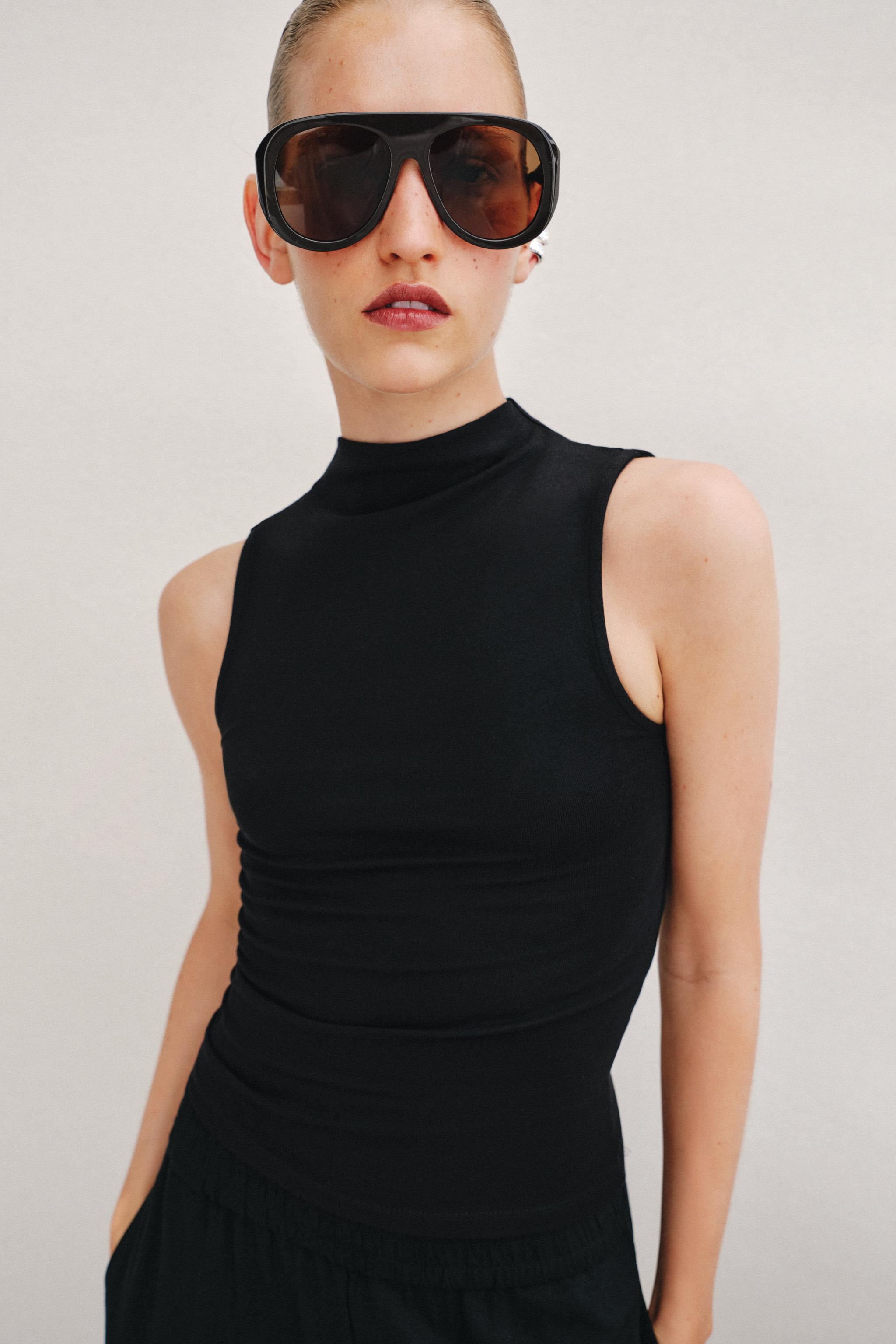 SLEEVELESS TOP — Black