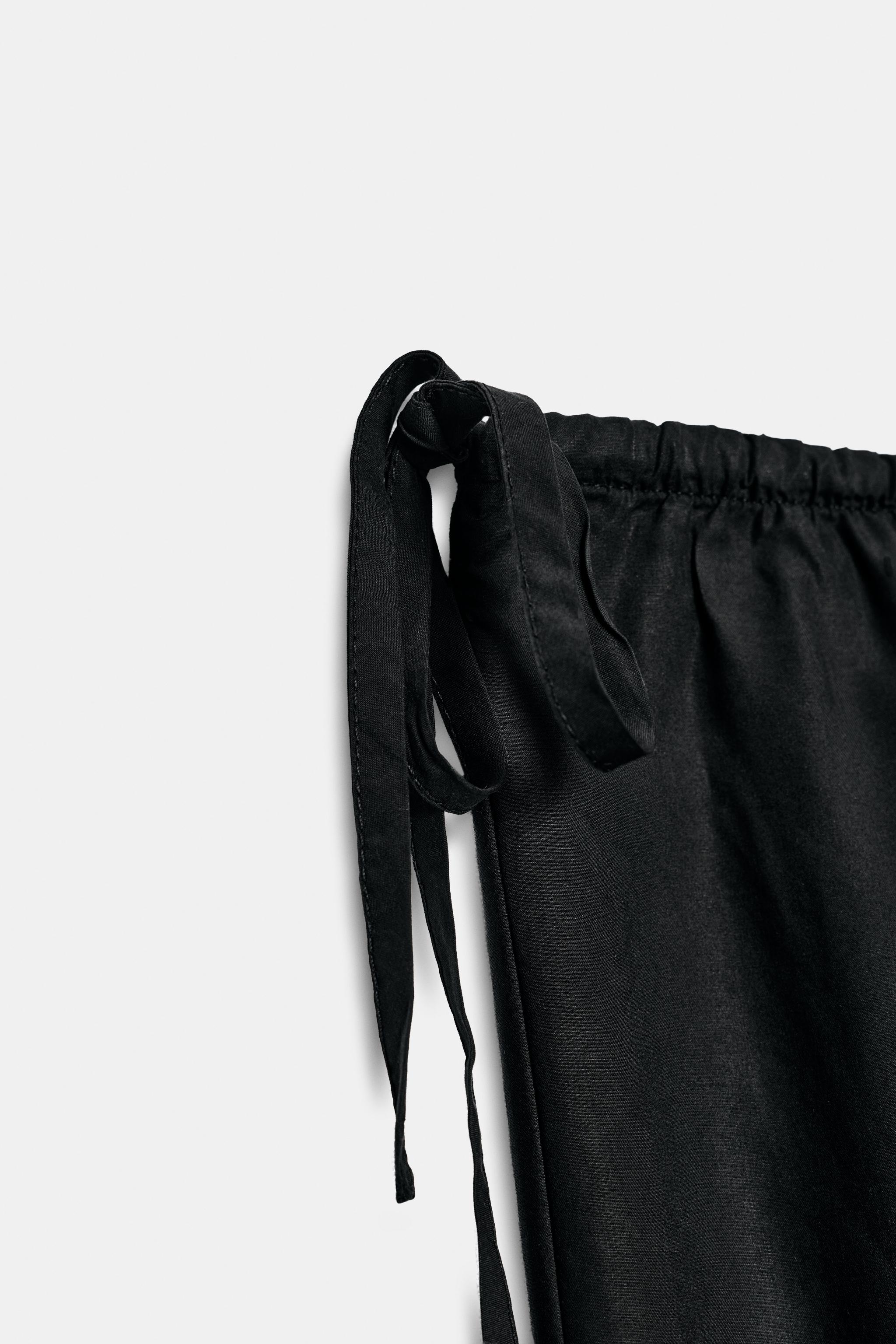 TIED ANKLE-LENGTH FLOWY PANTS
