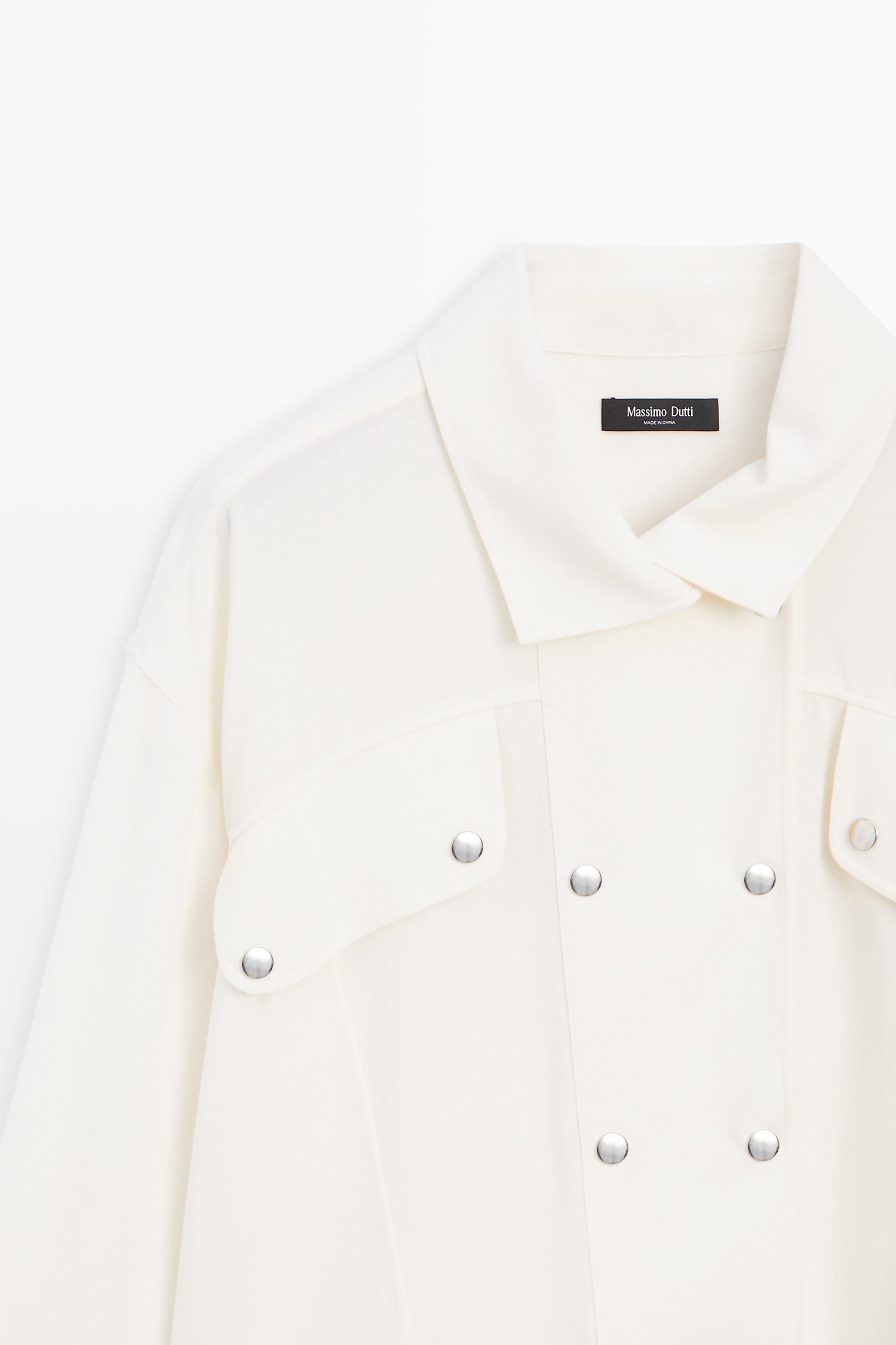 Flowing shirt with button-front detail