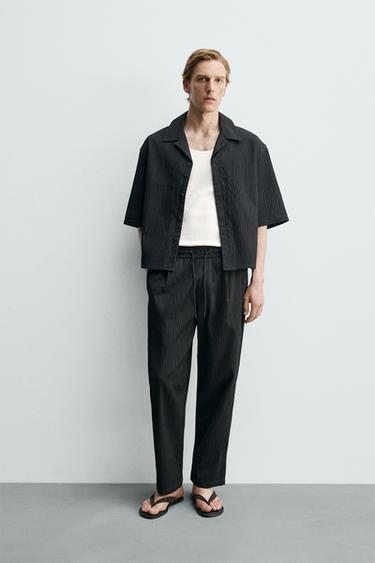 QUẦN ỐNG SUÔNG HỌA TIẾT NỔI - Màu đen từ Zara - Hình ảnh 0