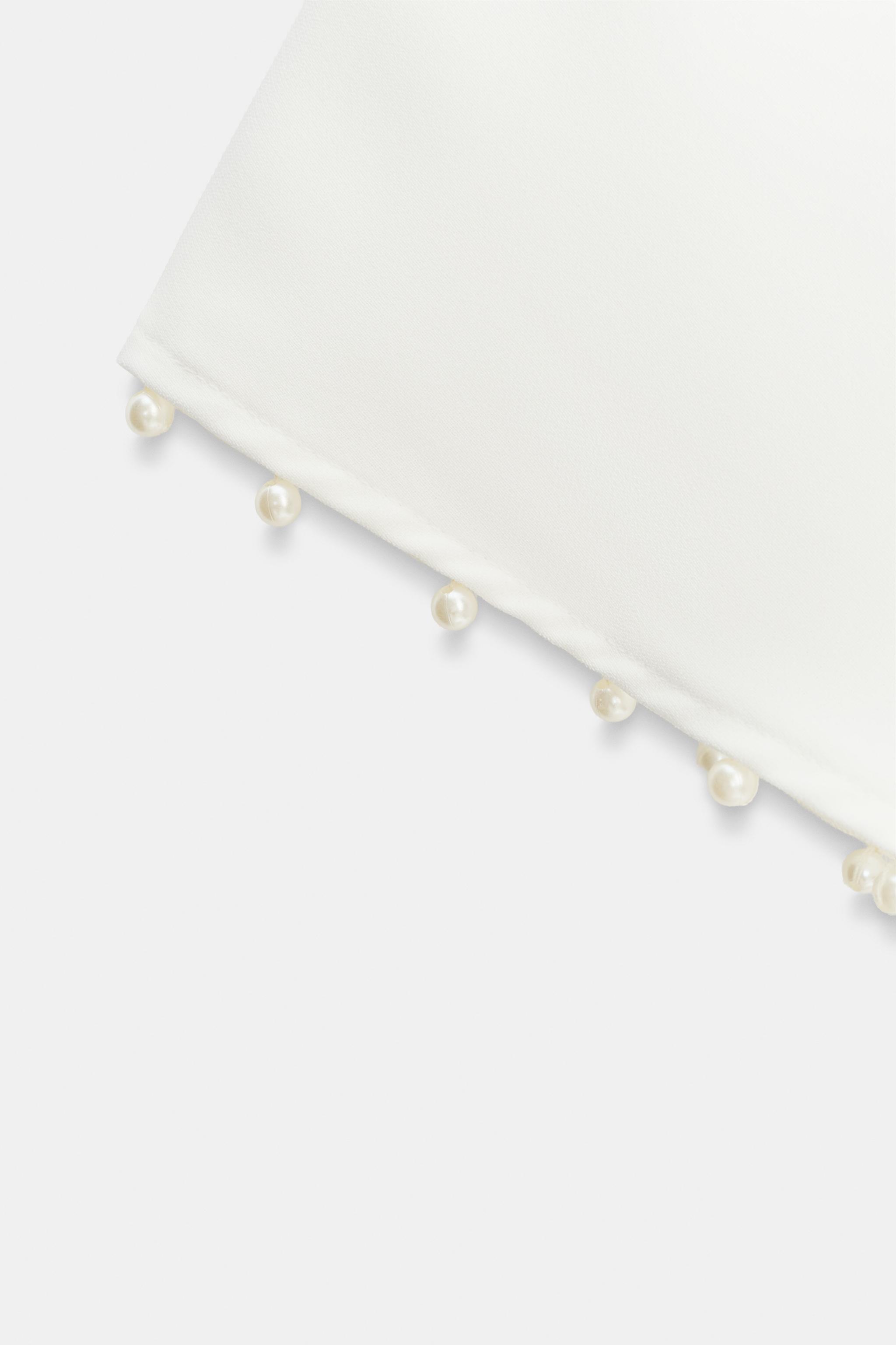 ASYMMETRIC PEARL TUNIC BLOUSE