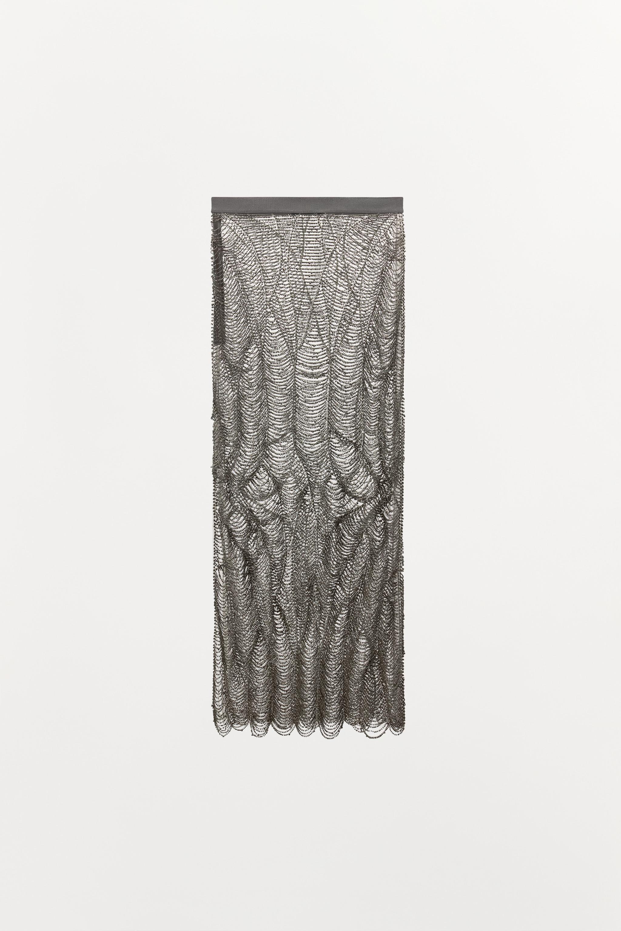 JUPE SEMI-TRANSPARENTE FANTAISIE